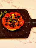 Pintxo mediterraneo con origano fresco e perle di balsamico