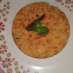 A picture of Tomato carrot rice.