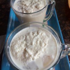 A picture of Cold coffee with vanilla ice cream.