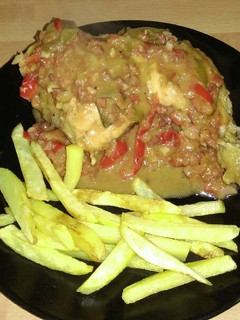 Una foto de Pollo al chilindrón
