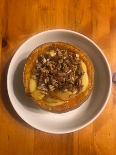 A picture of Butternut Squash Soup with Pecan Crumble.