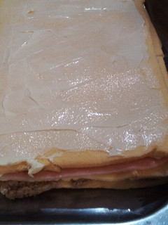 Una foto de Pionono o torta salada de atún jamón y queso