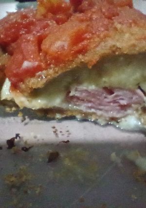 Una foto de Milanesa de berenjena rellena