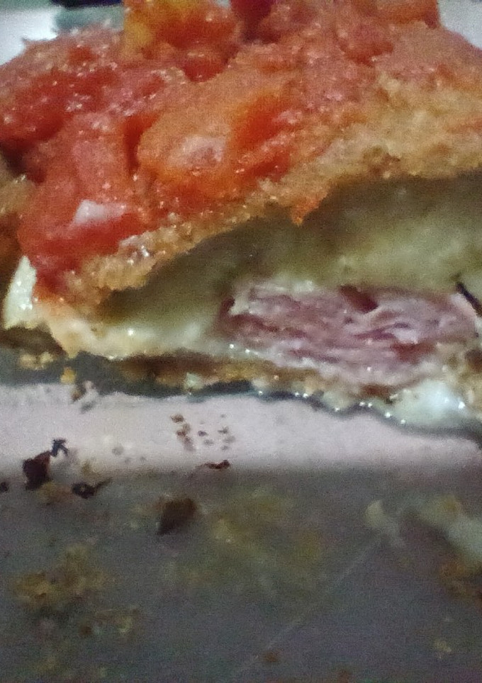 Una foto de Milanesa de berenjena rellena