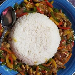 A picture of Rice and Shredded chicken sauce.