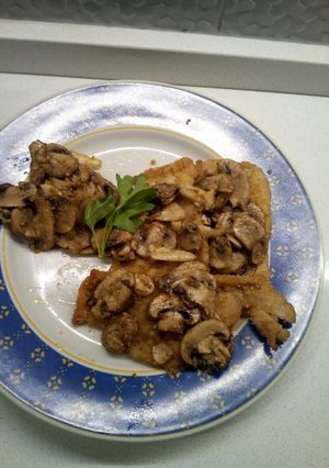 Foto di Scaloppine di lonza di maiale con i funghi al forno