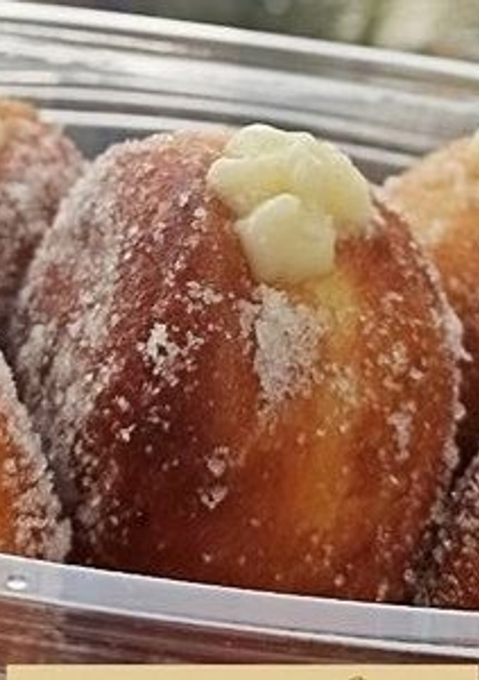 Una foto de Bombas rellenas con crema pastelera y Nutella