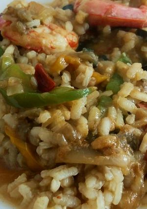 Una foto de Arroz meloso de langostinos, verduras y trufa negra