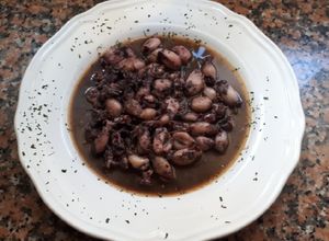 Una foto de Puntillas de chipirones al ajillo