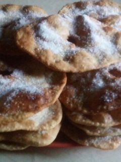 Una foto de Sopaipilla [o torta fritas]con azúcar