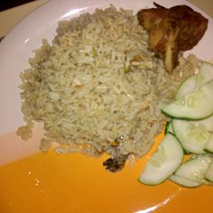 A picture of Coconut rice with turkey and cucumber.