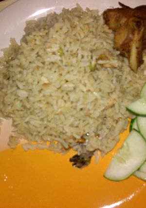 A picture of Coconut rice with turkey and cucumber.