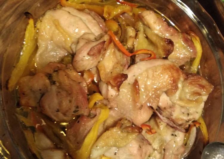 Simple roast chicken and red and yellow pepper traybake