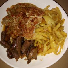 A picture of Chips with egg and kpomo.