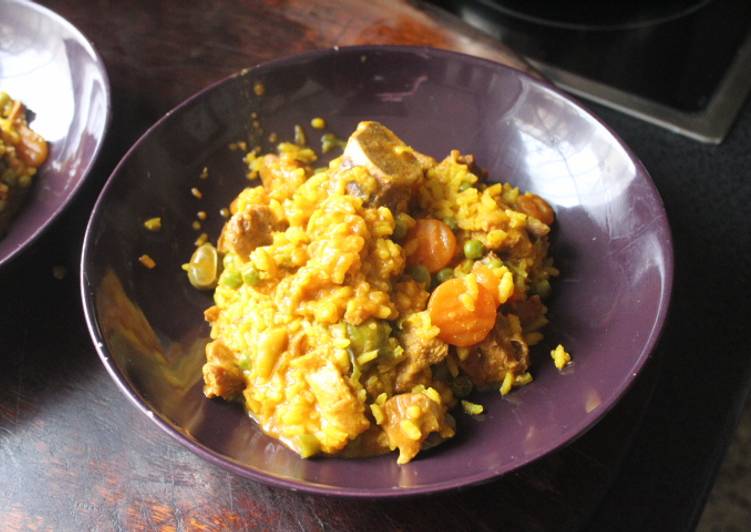 Arroz con daditos de cerdo y menestra