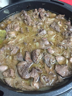 Una foto de Higaditos de pollo encebollado