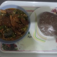 A picture of Okro with Ugu soup swallowed with Amala.