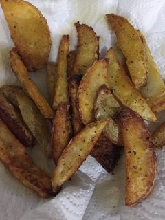 Una foto de Papas en gajos al horno