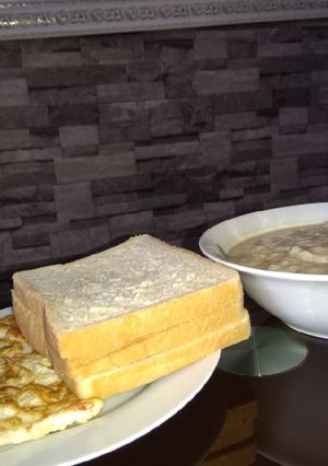 A picture of Omelette, bread and oats.
