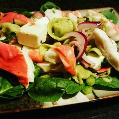 A picture of Imitation crab meat and tortellini salad.