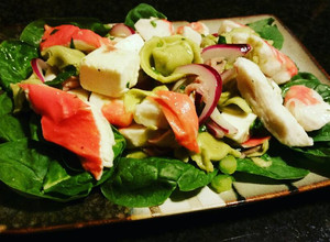 A picture of Imitation crab meat and tortellini salad.