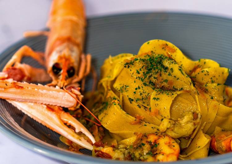 Recipe of Award-winning Pappardelle ai Crostacei con Crema di Prezzemolo ed Acciughe