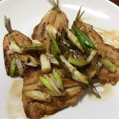 A picture of Fried sardines in Soy-balsamic sauce.