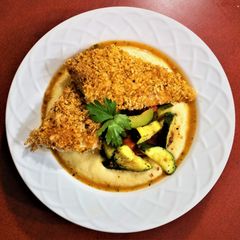A picture of Oven Fried Fish and Grits.