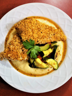 A picture of Oven Fried Fish and Grits.