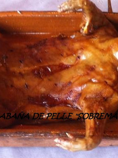 Una foto de Cochinillo al horno