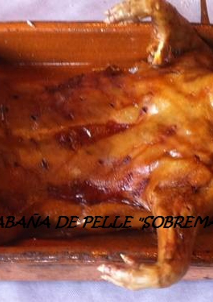 Una foto de Cochinillo al horno