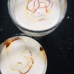 A picture of Banana, nuts, coconut milk smoothie.