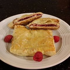 A picture of Raspberry White Chocolate Pastry Strudels.
