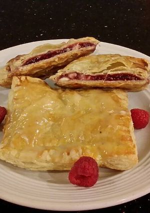 A picture of Raspberry White Chocolate Pastry Strudels.