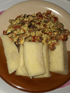 A picture of Boiled yam and egg sauce.