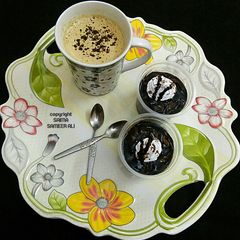 A picture of Eggless Chocolate Pudding With a cup of Cappuccino.