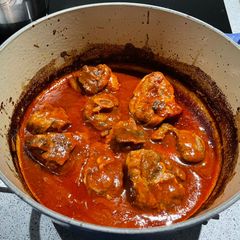 A picture of Braised lamb with pasta.