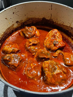A picture of Braised lamb with pasta.