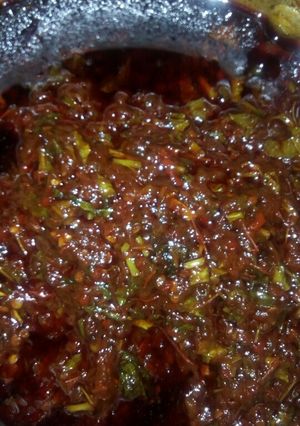 A picture of Tomatoes Stew with Spinach.