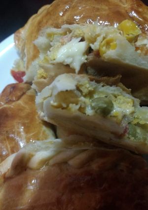 Una foto de Empanadas de choclo con jardinera y aceitunas