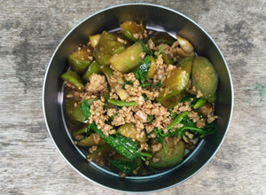 A picture of Stir-fried Eggplant with Minced Pork and Sweet Basil.