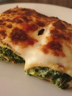 Una foto de Crepes con espinacas y ricota