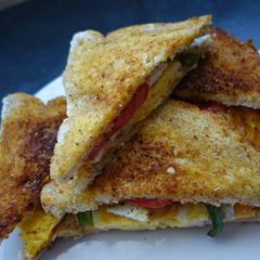 A picture of Fried eggs and cheese.