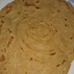 A picture of Lacha Dar Paratha in layers of three kind.