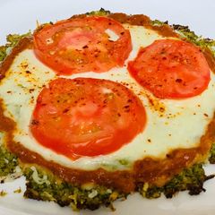 Broccoli tomato Pizza A picture of Broccoli tomato Pizza.