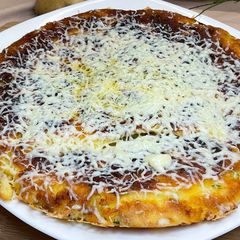 A picture of Mashed Potatoes with Cheese.