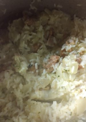 Una foto de Guisado de arroz y chorizo colorado