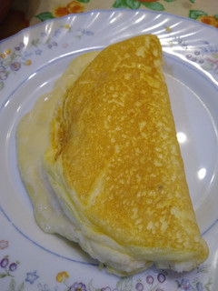Una foto de Omelette soufflé relleno de queso