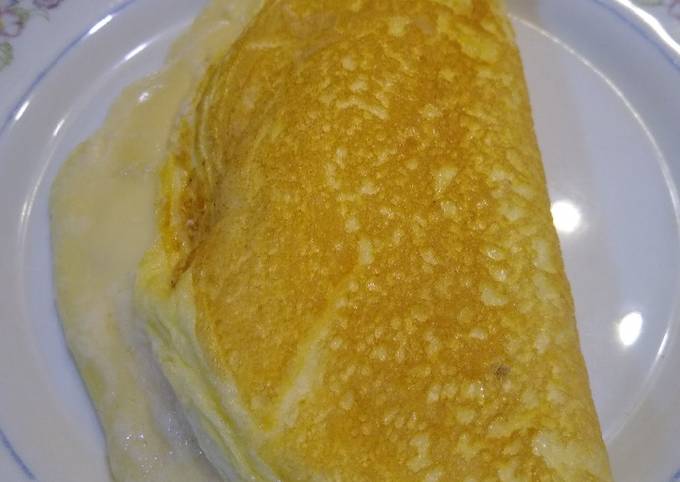 Omelette soufflé relleno de queso Receta de Kele- Cookpad