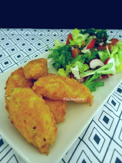 Una foto de Buñuelos de zanahoria y queso